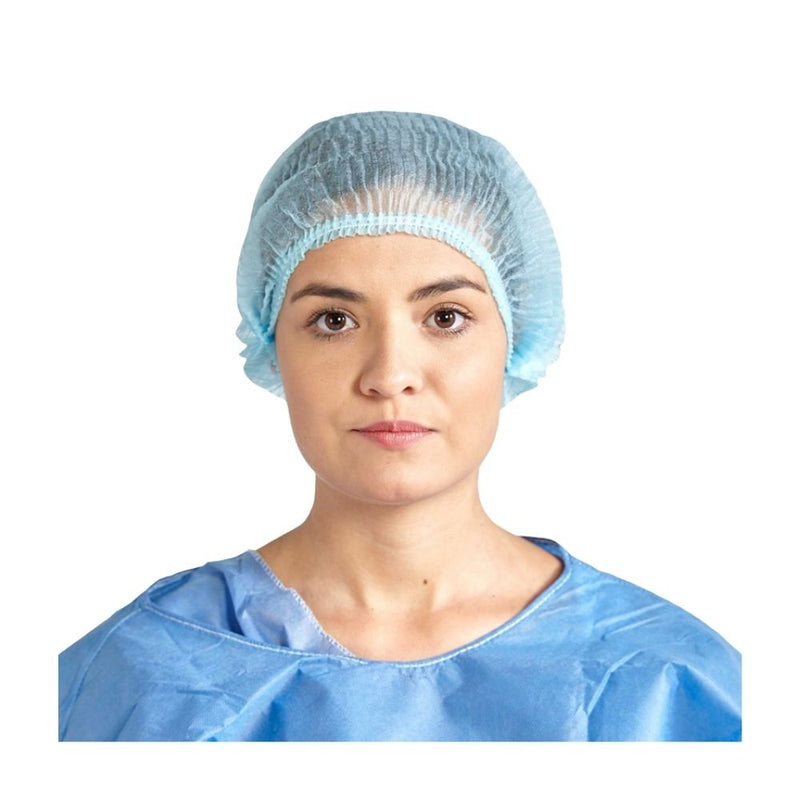 Cargue la imagen en el visor de la galería, Persona usando un gorro desechable Ambiderm azul, mostrando su ajuste cómodo
